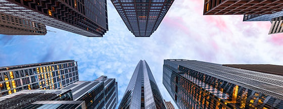 Upwards view of tall buildings