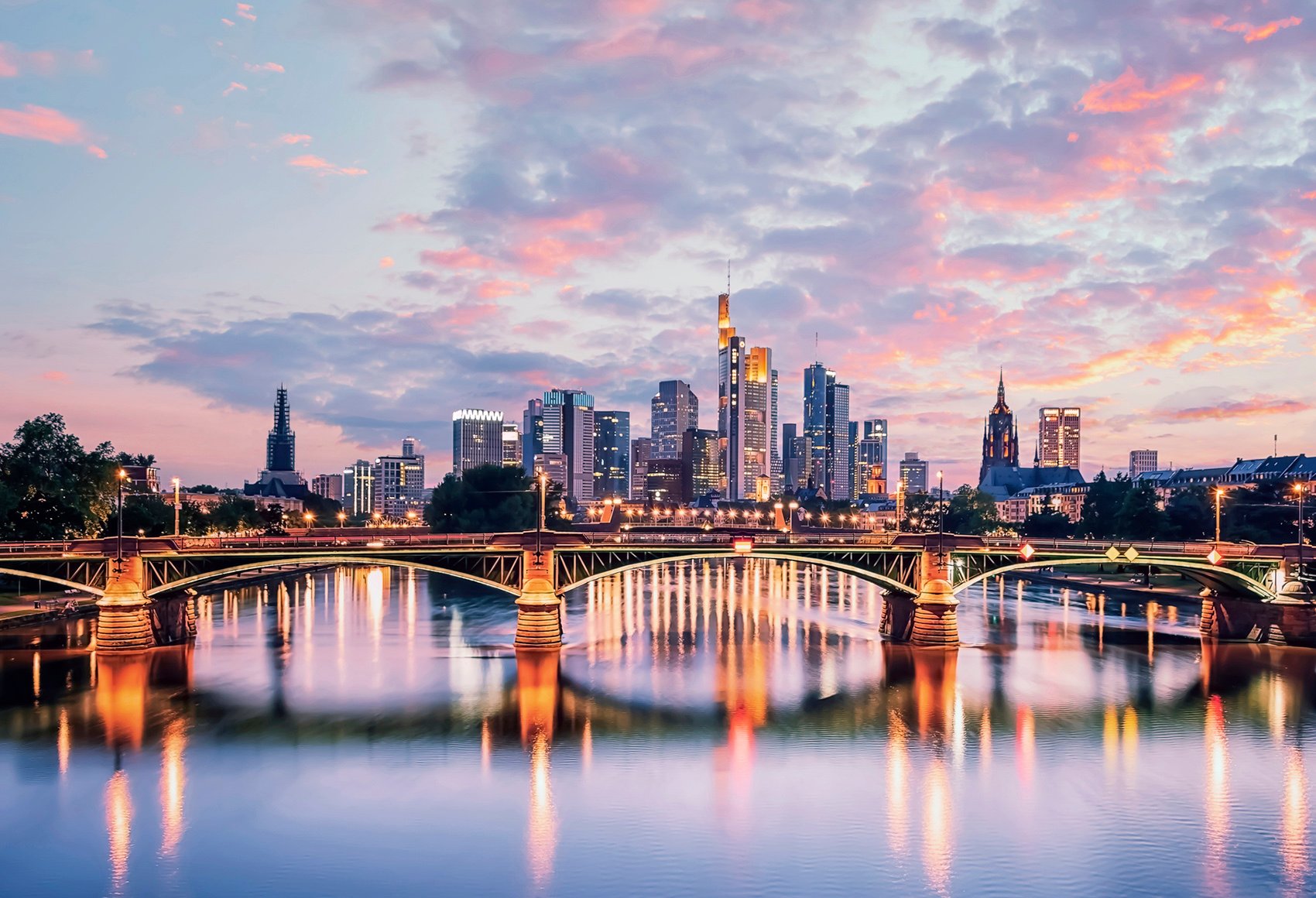 View of Frankfurt am Main skyline and the Main river at sunset