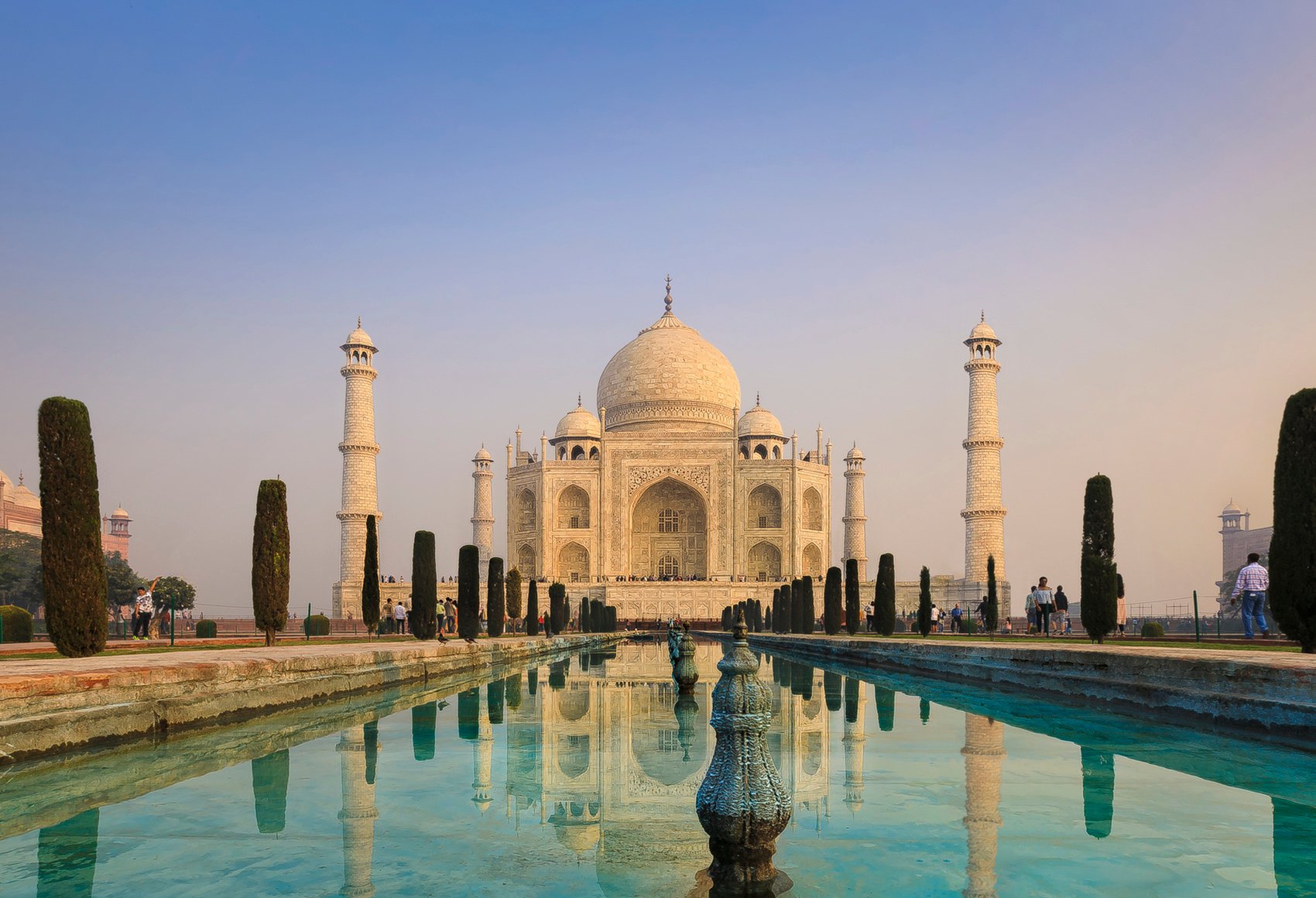 A shot of the Taj Mahal mausoleum and its reflection in a pool in Agra, Uttar Pradesh, India